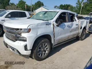 ✅ 2020 Chevrolet Silverado 1500 High Country • VIN: 1GCUYHEL6LZ144423 • Lot: 58948065. Wystawiony na Copart z przebiegiem 128 379 mil. Bezpłatny archiwum sprzedaży aukcyjnych z USA i szczegółowy raport historii pojazdu na DreamBid. Zdjęcie 1.