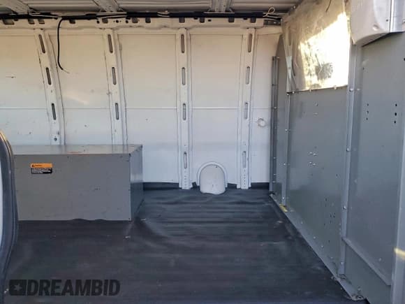 ✅ 2012 Chevrolet Express Cargo • VIN: 1GCWGFCB5C1123975 • Lot: 94299745. Listed on Copart with 120,082 mi. Free auction sales archive from the USA and detailed vehicle history report at DreamBid. Image 11.