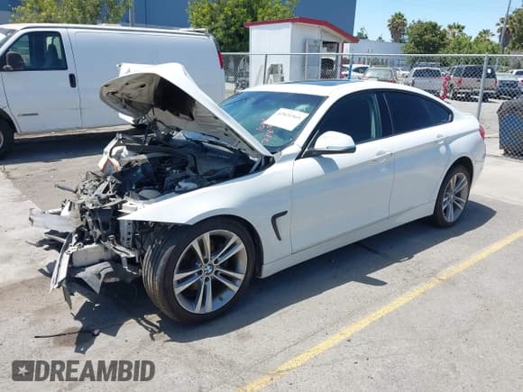 ✅ 2015 BMW 4 Series 428i • VIN: WBA4A9C57FGL86701 • Lot: 42831969. Listed on IAAI with 109,991 mi. Free auction sales archive from the USA and detailed vehicle history report at DreamBid. Image 18.