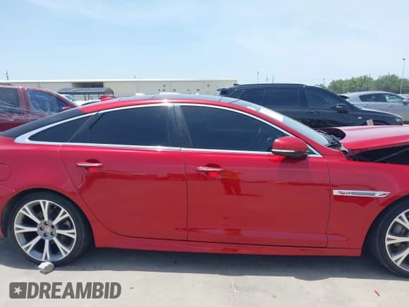 ✅ 2015 Jaguar XJ • VIN: SAJWA1CZ6F8V84696 • Лот: 42234757. Опубликован ранее на IAAI с пробегом 57 999 миль. Бесплатный доступ к архиву аукционных продаж из США и подробный отчёт об истории автомобиля на DreamBid. Изображение 14.