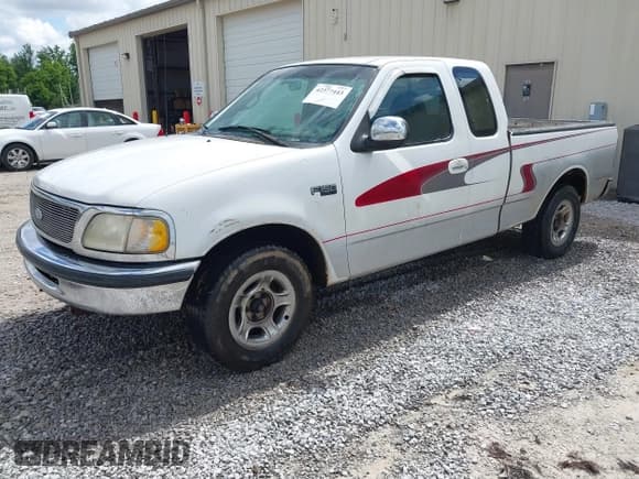 ✅ 1997 Ford F-150 XL • VIN: 1FTEX17L3VNB22949 • Lot: 42377443. Listed on IAAI with 119,148 mi. Free auction sales archive from the USA and detailed vehicle history report at DreamBid. Image 2.
