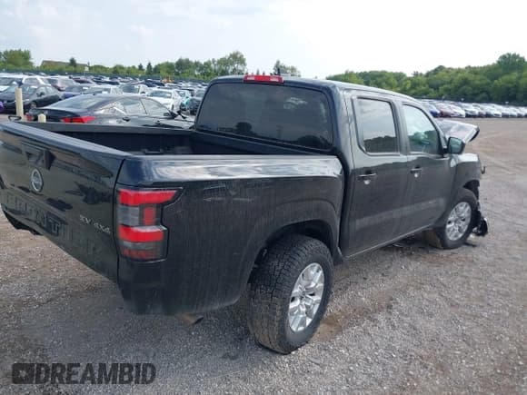✅ 2023 Nissan Frontier Pro-4X • VIN: 1N6ED1EK1PN655613 • Lot: 42964120. Listed on IAAI with 49,953 mi. Free auction sales archive from the USA and detailed vehicle history report at DreamBid. Image 4.