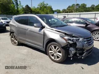 ✅ 2015 Hyundai Santa Fe • VIN: 5XYZWDLAXFG260605 • Лот: 49075103. Опубликован ранее на Copart с пробегом 107 150 миль. Бесплатный доступ к архиву аукционных продаж из США и подробный отчёт об истории автомобиля на DreamBid. Изображение 4.