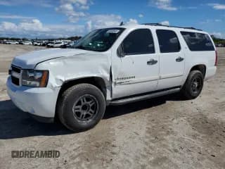 ✅ 2009 Chevrolet Suburban LS • VIN: 1GNFC16089R191553 • Лот: 46840045. Опубликован ранее на Copart с пробегом 144 334 миль. Бесплатный доступ к архиву аукционных продаж из США и подробный отчёт об истории автомобиля на DreamBid. Изображение 1.