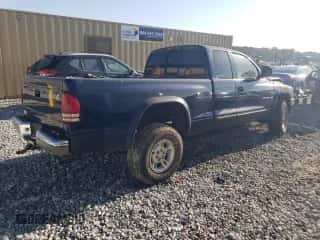 2000 Dodge Dakota Sport z VIN 1B7GG22N5YS733630, wystawiony jako Copart lot #67958294 z przebiegiem Nie podano mil oraz Nie do naprawy • Non repairable. Historia ofert i sprzedaży dostępna na DreamBid. Obrazek 3.
