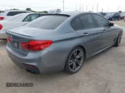 ✅ 2018 BMW 5 Series M550i xDrive • VIN: WBAJB9C55JB035694 • Lot: 42122730. Listed on IAAI with 61,561 mi. Free auction sales archive from the USA and detailed vehicle history report at DreamBid. Image 4.