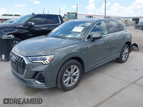 ✅ 2023 Audi Q3 S line Premium • VIN: WA1DECF38P1039312 • Lot: 42876268. Listed on IAAI with 56,339 mi. Free auction sales archive from the USA and detailed vehicle history report at DreamBid. Image 2.
