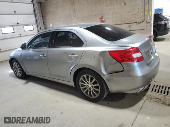 ✅ 2010 Suzuki Kizashi SE • VIN: JS2RE9A38A6100423 • Лот: 90283135. Опубликован ранее на Copart с пробегом 143 217 миль. Бесплатный доступ к архиву аукционных продаж из США и подробный отчёт об истории автомобиля на DreamBid. Изображение 2.