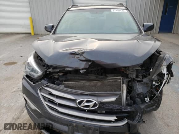 ✅ 2017 Hyundai Santa Fe 2.4L • VIN: 5XYZUDLB4HG488343 • Lot: 67198472. Listed on Copart with Not provided. Free auction sales archive from the USA and detailed vehicle history report at DreamBid. Image 7.