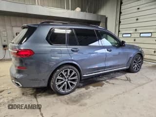 ✅ 2021 BMW X7 xDrive40i • VIN: 5UXCW2C00M9F02965 • Лот: 92995675. Опубликован ранее на Copart с пробегом 52 090 миль. Бесплатный доступ к архиву аукционных продаж из США и подробный отчёт об истории автомобиля на DreamBid. Изображение 3.