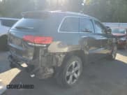 ✅ 2014 Jeep Grand Cherokee Overland • VIN: 1C4RJFCGXEC474530 • Lot: 86243445. Listed on Copart with 85,010 mi. Free auction sales archive from the USA and detailed vehicle history report at DreamBid. Image 3.