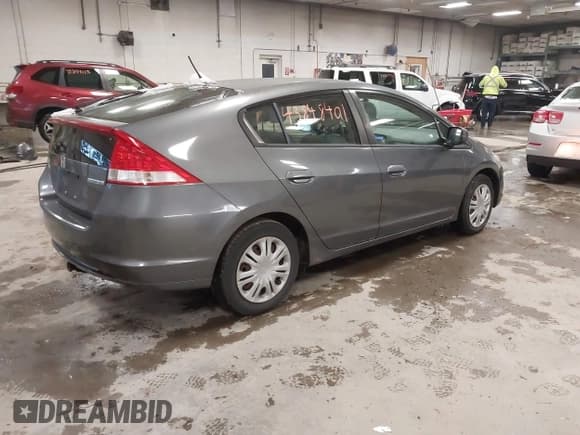 ✅ 2010 Honda Insight LX • VIN: JHMZE2H58AS038570 • Lot: 43848401. Listed on IAAI with 158,775 mi. Free auction sales archive from the USA and detailed vehicle history report at DreamBid. Image 4.