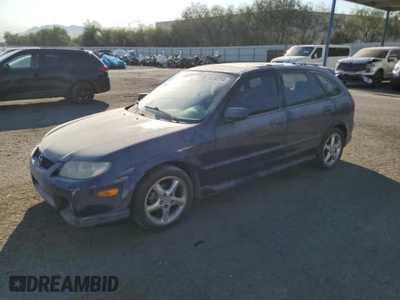 ✅ 2002 Mazda Protege • VIN: JM1BJ245921501313 • Lot: 74797214. Wystawiony na Copart z przebiegiem 241 536 mil. Bezpłatny archiwum sprzedaży aukcyjnych z USA i szczegółowy raport historii pojazdu na DreamBid. Zdjęcie 1.
