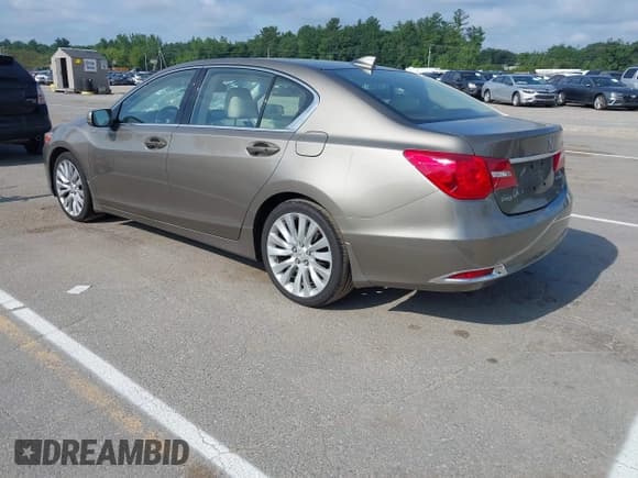 ✅ 2014 Acura RLX Technology • VIN: JH4KC1F53EC002869 • Lot: 42633612. Listed on IAAI with 147,271 mi. Free auction sales archive from the USA and detailed vehicle history report at DreamBid. Image 3.