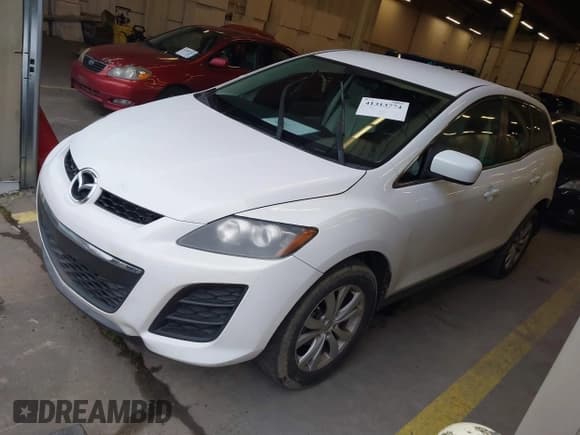 ✅ 2010 Mazda CX-7 Touring • VIN: JM3ER2WL2A0339666 • Lot: 41313774. Listed on IAAI with 171,234 mi. Free auction sales archive from the USA and detailed vehicle history report at DreamBid. Image 2.