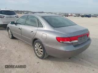 2007 Hyundai Azera SE z VIN KMHFC46F17A194011, wystawiony jako IAAI lot #41863372 z przebiegiem 161 904 mil mil oraz . Historia ofert i sprzedaży dostępna na DreamBid. Obrazek 3.