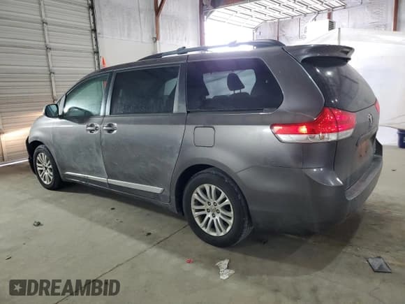 ✅ 2012 Toyota Sienna XLE • VIN: 5TDYK3DC9CS194175 • Лот: 92169005. Опубликован ранее на Copart с пробегом 152 928 миль. Бесплатный доступ к архиву аукционных продаж из США и подробный отчёт об истории автомобиля на DreamBid. Изображение 2.