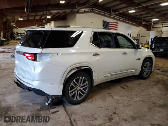 2022 Chevrolet Traverse High Country с VIN 1GNEVNKW5NJ173169, выставлен на аукционе Copart как лот 61679225 с пробегом 59 320 миль миль и Списание • Salvage title. История ставок и продаж доступна на DreamBid. Изображение 3.