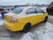 2011 Chevrolet Aveo 1LT z VIN KL1TD5DE2BB124564, wystawiony jako IAAI lot #41388512 z przebiegiem 109 833 mil mil oraz . Historia ofert i sprzedaży dostępna na DreamBid. Obrazek 4.