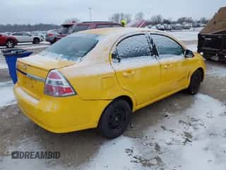 2011 Chevrolet Aveo 1LT z VIN KL1TD5DE2BB124564, wystawiony jako IAAI lot #41388512 z przebiegiem 109 833 mil mil oraz . Historia ofert i sprzedaży dostępna na DreamBid. Obrazek 4.