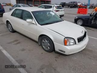 ✅ 2001 Cadillac DeVille • VIN: 1G6KD54Y71U164594 • Лот: 41833145. Опубликован ранее на IAAI с пробегом 124 663 миль. Бесплатный доступ к архиву аукционных продаж из США и подробный отчёт об истории автомобиля на DreamBid. Изображение 1.