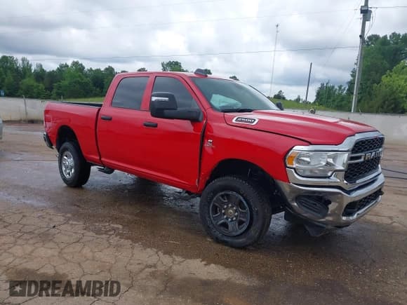 ✅ 2024 Ram 2500 Tradesman • VIN: 3C6UR5CL2RG235185 • Lot: 42241146. Listed on IAAI with 11,312 mi. Free auction sales archive from the USA and detailed vehicle history report at DreamBid. Image 1.