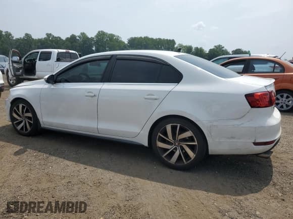 ✅ 2013 Volkswagen Jetta Autobahn • VIN: 3VW4A7AJ2DM395295 • Lot: 60647345. Listed on Copart with 198,802 mi. Free auction sales archive from the USA and detailed vehicle history report at DreamBid. Image 2.