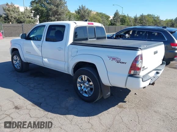 ✅ 2012 Toyota Tacoma • VIN: 3TMLU4EN6CM089216 • Lot: 43336629. Listed on IAAI with 135,350 mi. Free auction sales archive from the USA and detailed vehicle history report at DreamBid. Image 3.