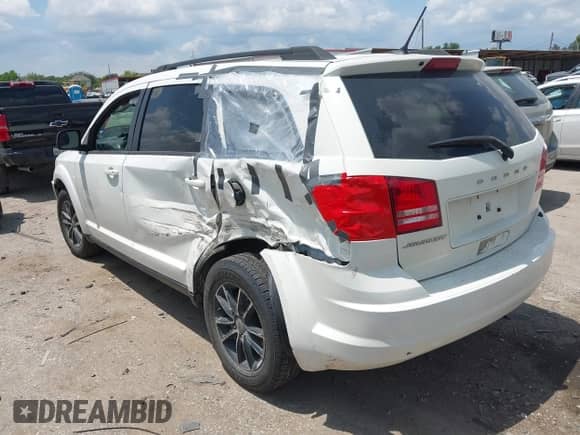 2018 Dodge Journey SE с VIN 3C4PDCAB2JT288452, выставлен на аукционе IAAI как лот 42955923 с пробегом 185 068 миль миль и . История ставок и продаж доступна на DreamBid. Изображение 3.