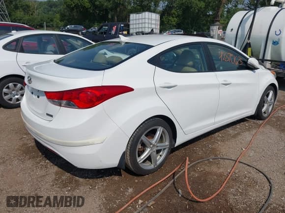✅ 2012 Hyundai Elantra GLS • VIN: 5NPDH4AE5CH146106 • Lot: 42870675. Listed on IAAI with 129,214 mi. Free auction sales archive from the USA and detailed vehicle history report at DreamBid. Image 4.