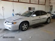✅ 2002 Pontiac Grand Prix SE • VIN: 1G2WK52J12F120417 • Лот: 65896835. Опубликован ранее на Copart с пробегом 142 302 миль. Бесплатный доступ к архиву аукционных продаж из США и подробный отчёт об истории автомобиля на DreamBid. Изображение 1.