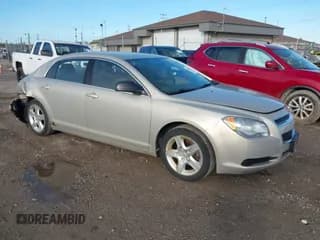 ✅ 2011 Chevrolet Malibu 1LS • VIN: 1G1ZB5E12BF167825 • Lot: 43434145. Listed on IAAI with 130,457 mi. Free auction sales archive from the USA and detailed vehicle history report at DreamBid. Image 1.