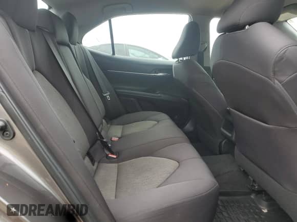 2021 Toyota Camry LE z VIN 4T1R11BK4MU035322, wystawiony jako Copart lot #64804995 z przebiegiem 89 483 mil mil oraz Szkoda całkowita • Salvage title. Historia ofert i sprzedaży dostępna na DreamBid. Obrazek 10.