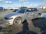 2018 Dodge Charger SXT Plus z VIN 2C3CDXHG7JH162849, wystawiony jako Copart lot #90515255 z przebiegiem 74 757 mil mil oraz Szkoda całkowita • Salvage title. Historia ofert i sprzedaży dostępna na DreamBid. Obrazek 1.