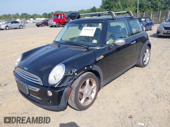 ✅ 2005 MINI Hardtop • VIN: WMWRC335X5TJ72336 • Lot: 42584154. Listed on IAAI with 168,135 mi. Free auction sales archive from the USA and detailed vehicle history report at DreamBid. Image 2.
