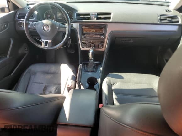 ✅ 2014 Volkswagen Passat Wolfsburg Edition • VIN: 1VWAT7A33EC113778 • Lot: 51877035. Listed on Copart with 166,720 mi. Free auction sales archive from the USA and detailed vehicle history report at DreamBid. Image 8.