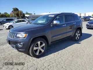 ✅ 2015 Jeep Grand Cherokee Overland • VIN: 1C4RJFCM3FC887817 • Lot: 57420185. Listed on Copart with 145,971 mi. Free auction sales archive from the USA and detailed vehicle history report at DreamBid. Image 1.