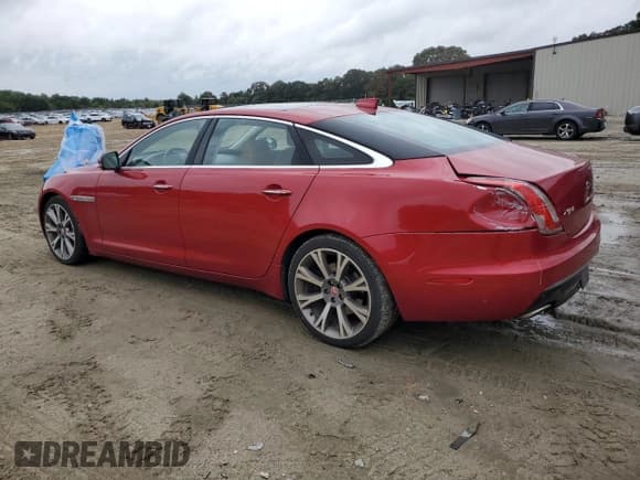 ✅ 2016 Jaguar XJ Portfolio • VIN: SAJWA2G72G8V90947 • Lot: 69762385. Listed on Copart with 76,958 mi. Free auction sales archive from the USA and detailed vehicle history report at DreamBid. Image 2.