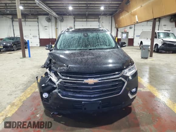 ✅ 2021 Chevrolet Traverse LT Cloth • VIN: 1GNEVGKW3MJ235078 • Lot: 90595675. Listed on Copart with 66,946 mi. Free auction sales archive from the USA and detailed vehicle history report at DreamBid. Image 5.