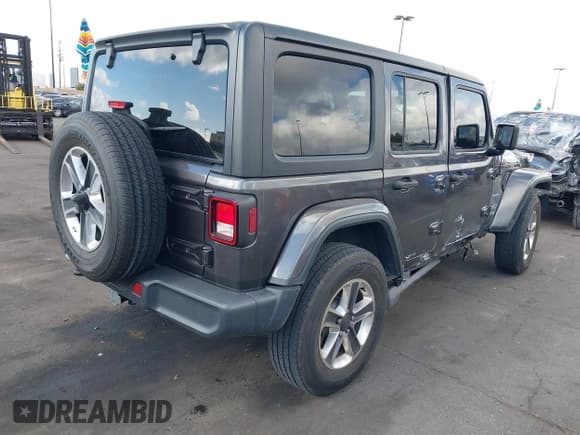 ✅ 2021 Jeep Wrangler Unlimited Sahara • VIN: 1C4HJXEN4MW503014 • Lot: 41900234. Listed on IAAI with 16,444 mi. Free auction sales archive from the USA and detailed vehicle history report at DreamBid. Image 4.