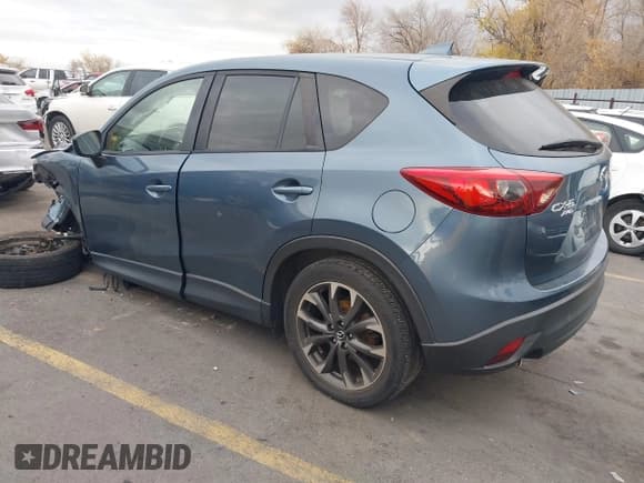 ✅ 2016 Mazda CX-5 Grand Touring • VIN: JM3KE4DY0G0790824 • Lot: 43736594. Wystawiony na IAAI z przebiegiem Nie podano. Bezpłatny archiwum sprzedaży aukcyjnych z USA i szczegółowy raport historii pojazdu na DreamBid. Zdjęcie 3.