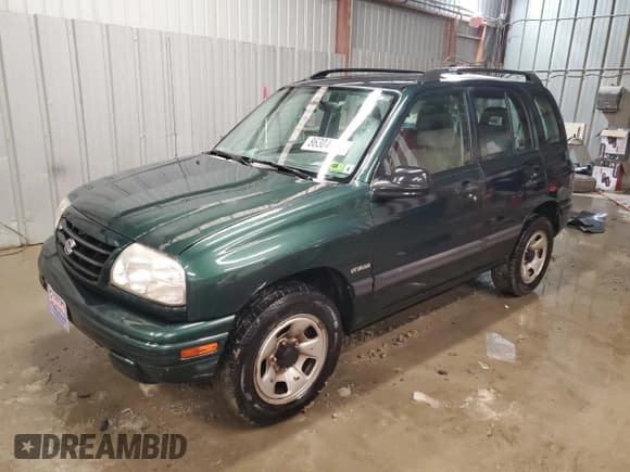 ✅ 2002 Suzuki Vitara JLX • VIN: 2S3TD52V126103138 • Лот: 86304474. Опубликован ранее на Copart с пробегом 135 833 миль. Бесплатный доступ к архиву аукционных продаж из США и подробный отчёт об истории автомобиля на DreamBid. Изображение 1.