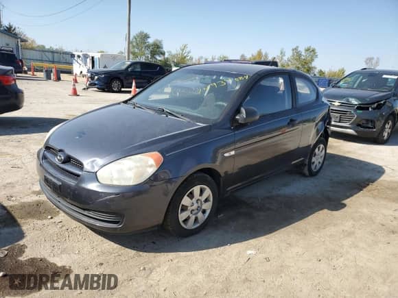 2007 Hyundai Accent GS with VIN KMHCM36CX7U029556, listed as a Copart auction lot 74939084 with 154,806 mi miles and Salvage title. Bid and sale history available at DreamBid. Image 1.