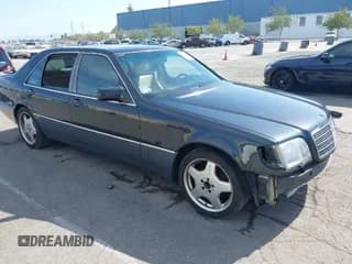 ✅ 1993 Mercedes-Benz 500 • VIN: WDBGA51E5PA138123 • Lot: 42012923. Listed on IAAI with 141,594 mi. Free auction sales archive from the USA and detailed vehicle history report at DreamBid. Image 1.