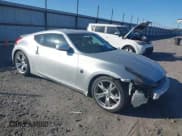 ✅ 2009 Nissan 370Z Touring • VIN: JN1AZ44EX9M403421 • Lot: 43590769. Listed on IAAI with 182,981 mi. Free auction sales archive from the USA and detailed vehicle history report at DreamBid. Image 1.
