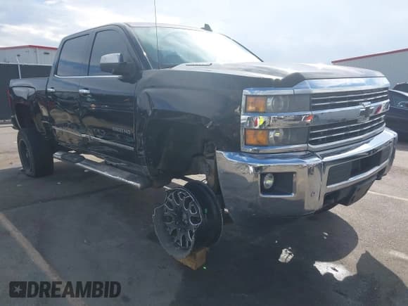 ✅ 2015 Chevrolet Silverado 2500HD LTZ • VIN: 1GC1KWE84FF609940 • Lot: 43407719. Listed on IAAI with 165,422 mi. Free auction sales archive from the USA and detailed vehicle history report at DreamBid. Image 1.