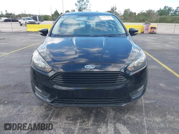 ✅ 2016 Ford Focus SE • VIN: 1FADP3FE7GL215777 • Lot: 43480286. Listed on IAAI with 70,597 mi. Free auction sales archive from the USA and detailed vehicle history report at DreamBid. Image 12.
