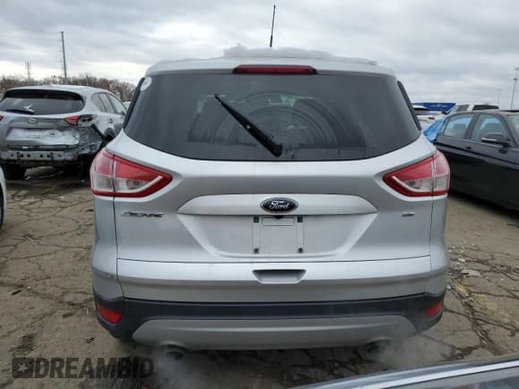 ✅ 2015 Ford Escape SE • VIN: 1FMCU0G76FUB71465 • Lot: 91643735. Listed on Copart with 66,860 mi. Free auction sales archive from the USA and detailed vehicle history report at DreamBid. Image 6.