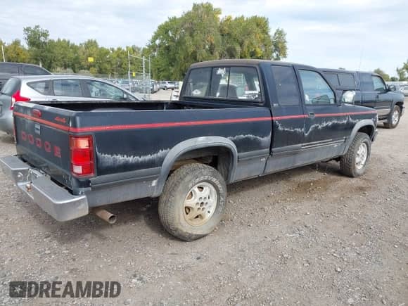 1994 Dodge Dakota with VIN 1B7GG23X9RS562415, listed as a IAAI auction lot 43365648 with 157,671 mi miles and . Bid and sale history available at DreamBid. Image 4.