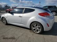 ✅ 2017 Hyundai Veloster • VIN: KMHTC6AD8HU311359 • Lot: 49013005. Wystawiony na Copart z przebiegiem 117 602 mil. Bezpłatny archiwum sprzedaży aukcyjnych z USA i szczegółowy raport historii pojazdu na DreamBid. Zdjęcie 2.